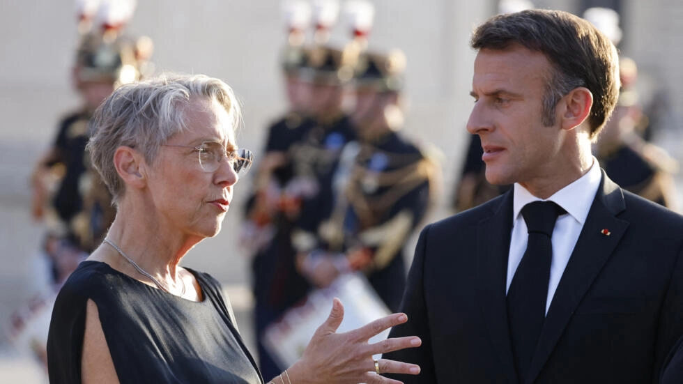 フランスのエマニュエル・マクロン大統領とエリザベート・ボルヌ首相、2023年7月14日。© AFP / LUDOVIC MARIN