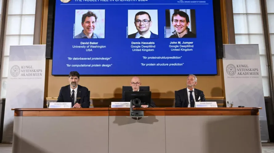 2024年のノーベル化学賞は、デビッド・ベイカー、デミス・ハッサビス、ジョン・M.に授与されました。タンパク質に関する彼らの研究のためのジャンパー。© AFP - ジョナサン・ナックストランド